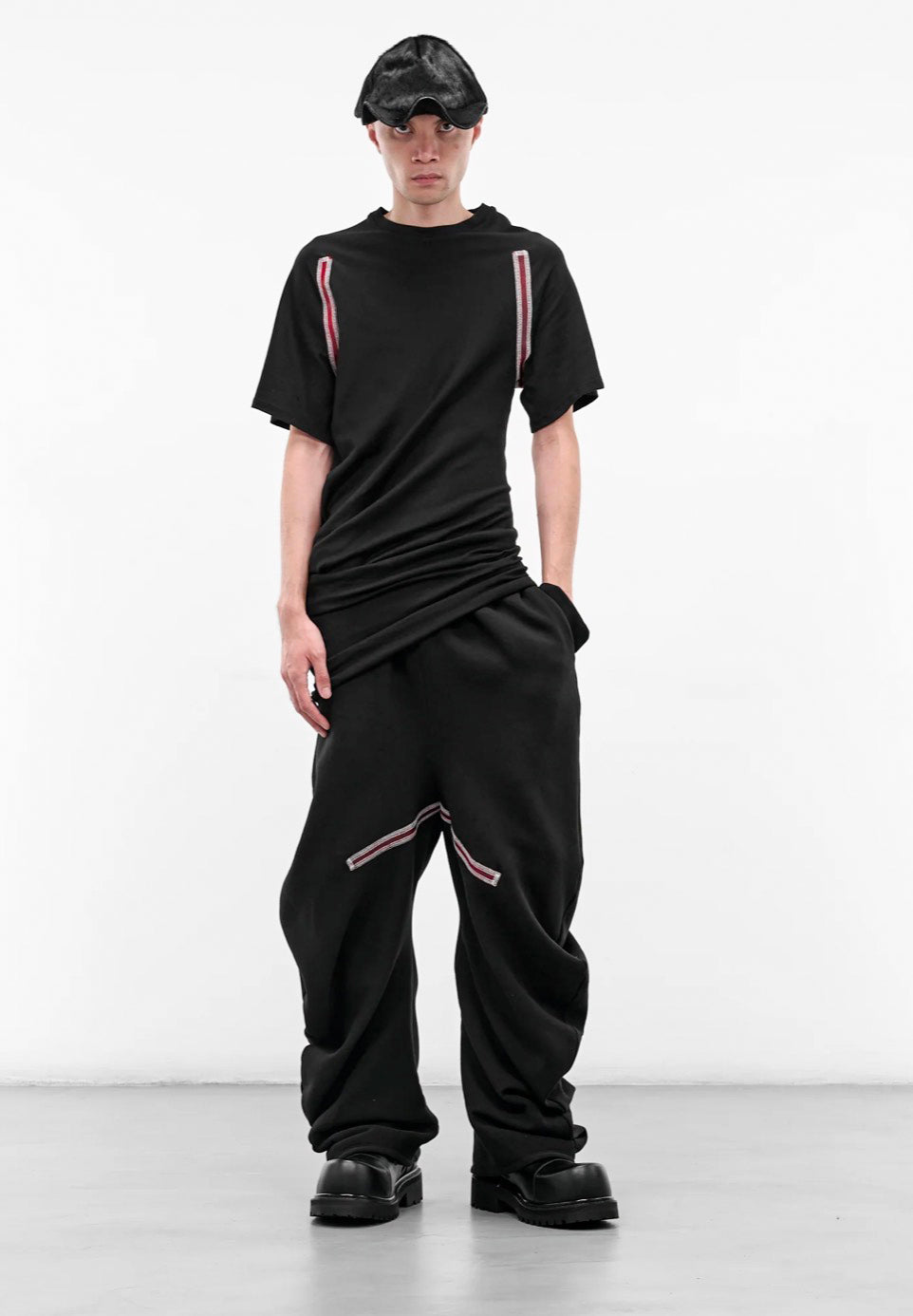 BLACK TWISTED TRACK PANTS